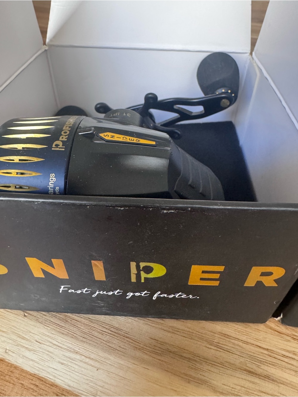 PROFISHIENCY SNIPER Spinning Reel - Black with Gold Accents New